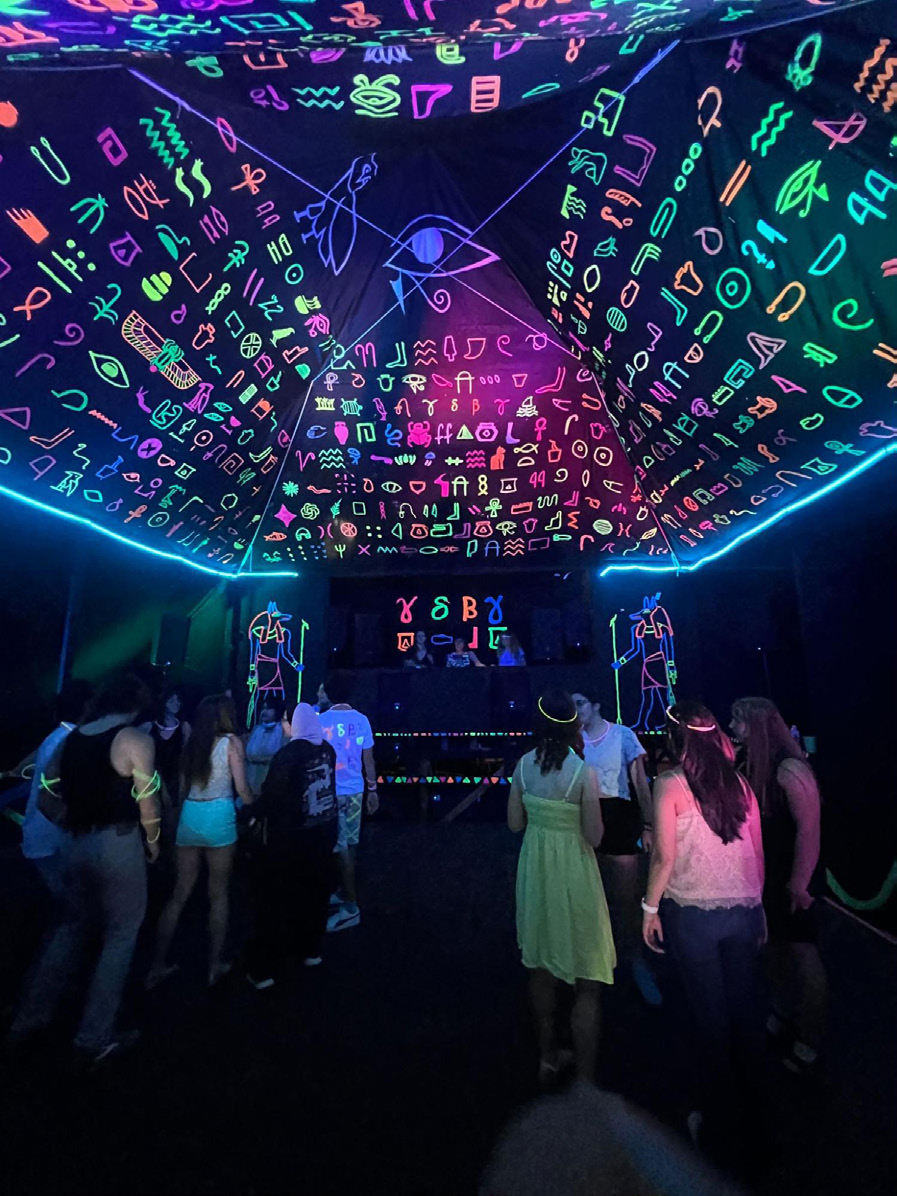 Blacker Raises the Neon Pyramid